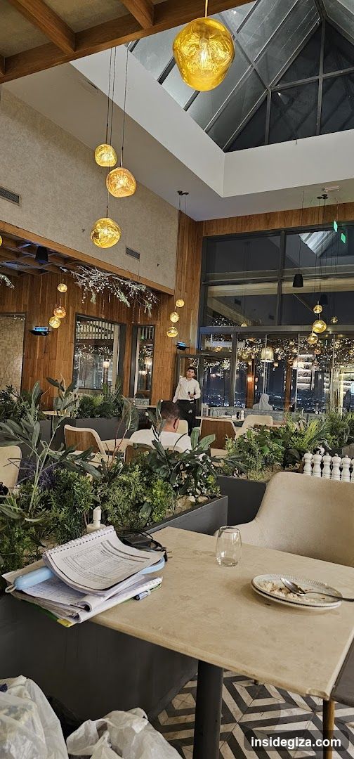 Restaurant Interior with Plants and Lighting