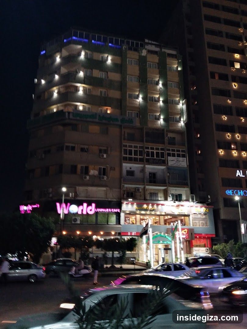 Night Street Scene with Buildings and Cars