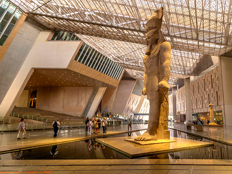 Grand Hall of the Grand Egyptian Museum in Giza, with the colossal statue of Ramses II