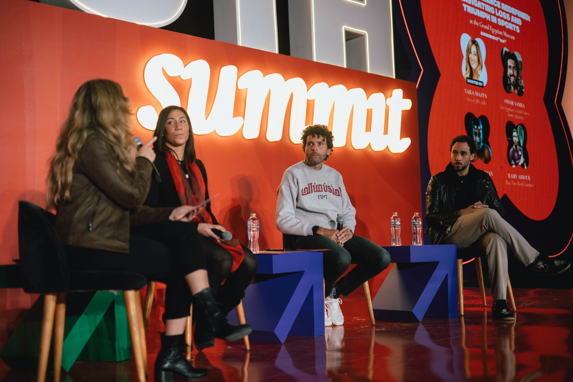 Panel talk on the red stage at UTH Festival 2024 inside the Grand Egyptian Museum