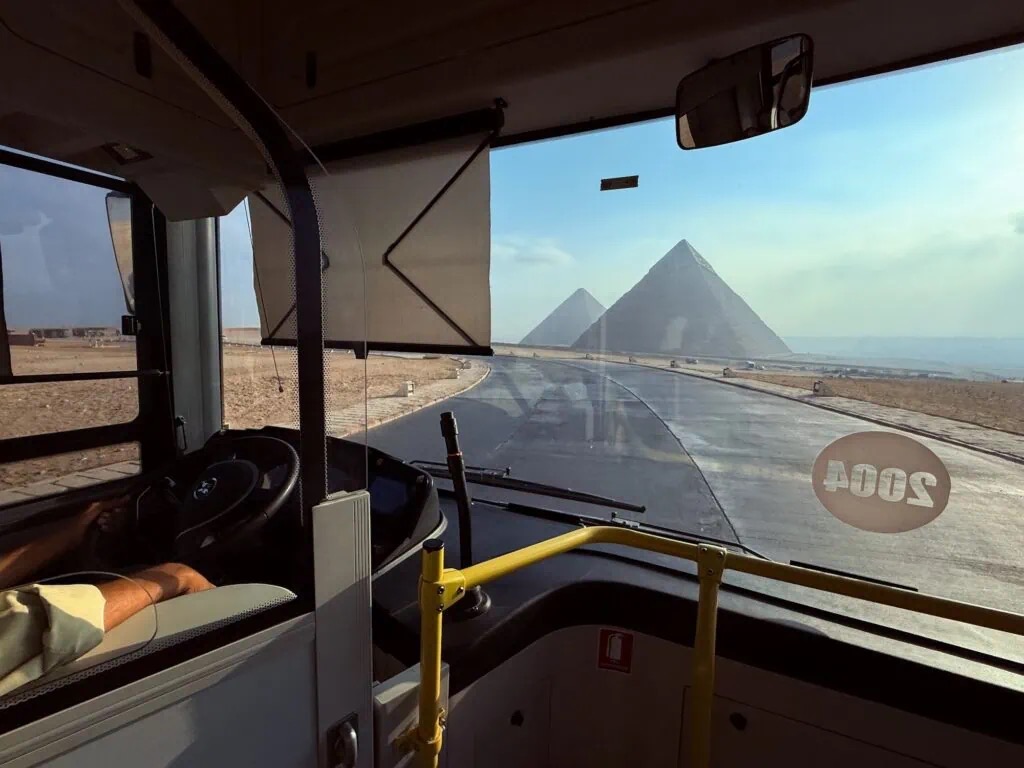 View from a shuttle bus approaching the Giza Pyramids